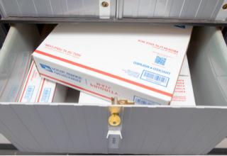 Extra Large PO Box, Size 5, with multiple medium-sized packages.